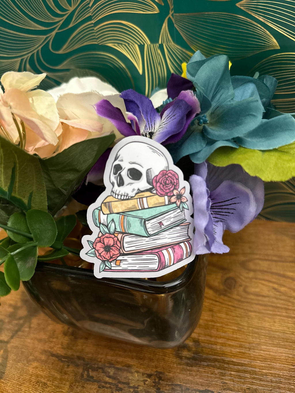 Skull on books sticker