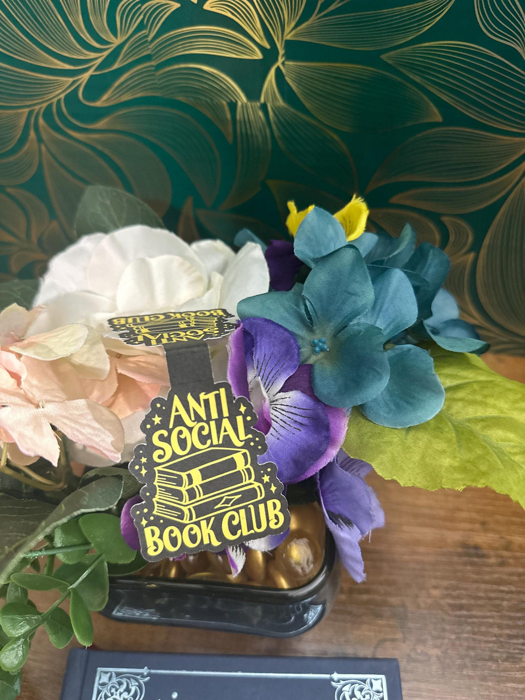 Anti-social magnetic bookmark